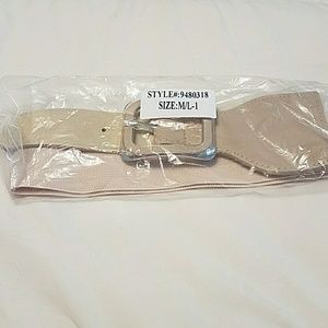 M/L stretch belt, NWT, cream color. From N.Y. & Co